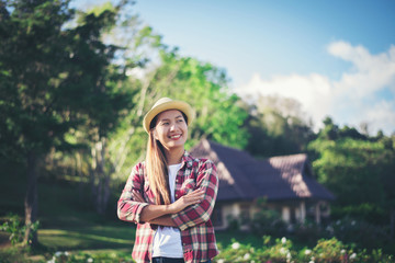 Young Woman standing alone outdoor  in nature