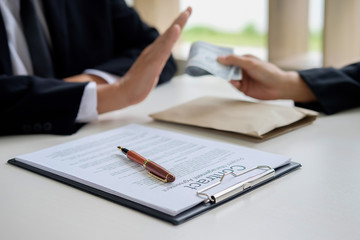 Hand giving money to other hand. anti Corruption concept