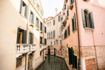 Fototapeta na wymiar Channel in Venice, Italy. Old Town with Beautiful Buildings.