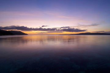 Fototapeta na wymiar amazing sunset on the sea in raja ampat archipelago
