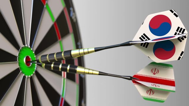 Flags of South Korea and Iran on darts hitting bullseye of the target. International cooperation or competition conceptual animation