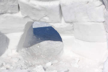 Entrance to the snow construction of an igloo