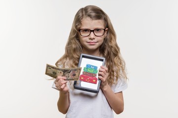 Travel, adventure, vacation. Emotional girl holding money and frame with picture of heap of suitcases, white background, copy space