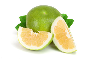 Citrus Sweetie or Pomelit, oroblanco with slices and leaf isolated on white background close-up