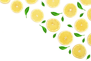 Slices lemon decorated with green leaves isolated on white background with copy space for your text. Flat lay, top view