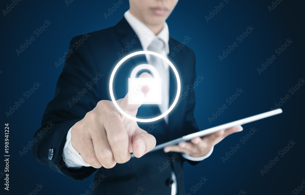 Poster businessman using digital tablet and pressing lock icon on screen. security system concept
