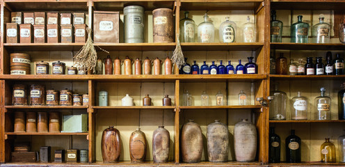 Bottles on the shelf in old pharmacy