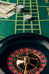 Casino table with roulette and placed chips