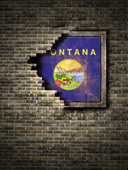 Old Montana flag in brick wall