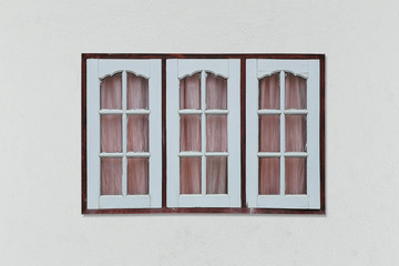 Old vintage wood window on gray wall background and have clipping paths function for easy to use.