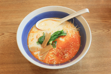 Tonkotsu Ramen in a bowl on table of Japanese Foods.