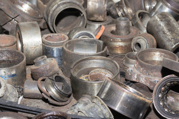 Useless, worn out rusty auto parts and other parts