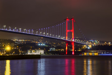 Fototapeta na wymiar Night view of Bosphorus bridge with lights Istanbul, Turkey