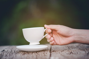 Our hands and our delicious cup of coffee.