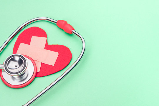 healthcare and medicine stethoscope and red heart symbol healthy and insurance world health day concept