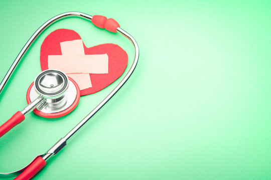 healthcare and medicine stethoscope and red heart symbol healthy and insurance world health day concept