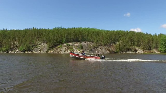 Men in motorboat on the lake