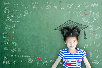 Smart educated school kid student with graduation hat doodle on chalkboard  for children's...