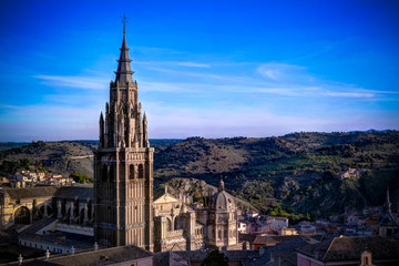 Fototapeta na wymiar Panoramic aerial view to Toledo cathedral from the belltower of Jesuit San Ildefonso Church, Toledo, Spain
