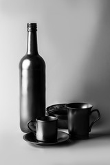 Set of dishes in black and white.