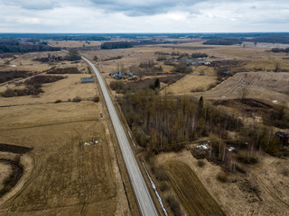 drone image. aerial view of rural area with houses and road network. populated area Dubulti near Jekabpils, Latvia