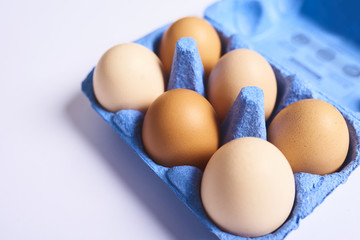 Fresh eggs over background