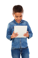 Latin funny child with a tablet