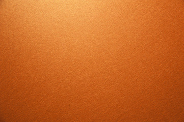 Texture of golden glitter paper background. Macro photo