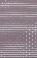 Texture of a brick violet wall