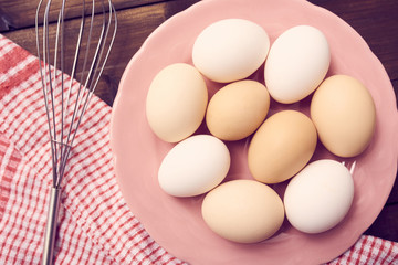 Fresh eggs over background
