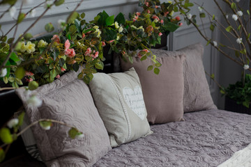 Bed with canopy pillows and flowers