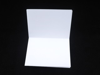 paper on a black background