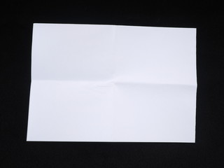 paper on a black background