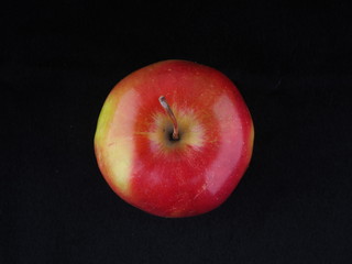 apple on a black background