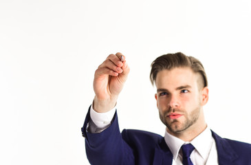 Businessman holds pen or stylus and work with modern technology