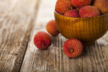 Lychee in a wooden bowl