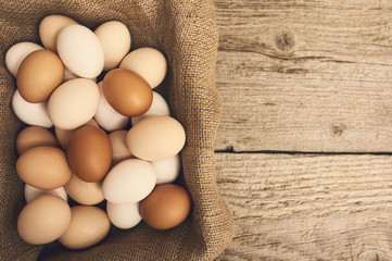 Fresh eggs over background