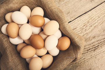 Fresh eggs over background