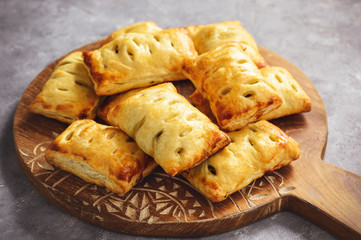 Spinach puff pastries with feta cheese.