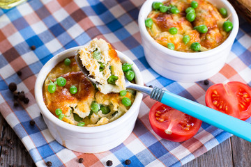 Casserole with cheese and zucchini in baking dish