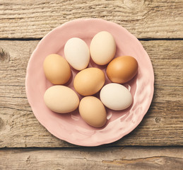 Fresh eggs over background