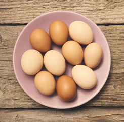 Fresh eggs over background