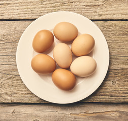 Fresh eggs over background