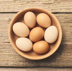 Fresh eggs over background