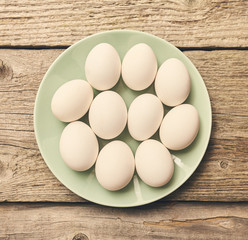 Fresh eggs over background
