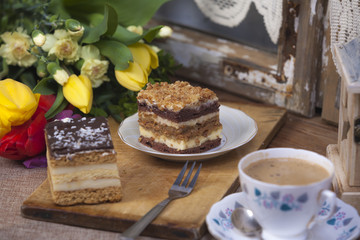 Tasty cake and flowers