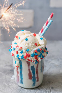 Vanilla funfetti milkshake with ice cream. Patriotic drink cocktail