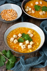 Bowl of bean soup with parsley