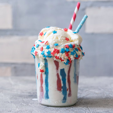 Vanilla funfetti milkshake with ice cream. Patriotic drink cocktail