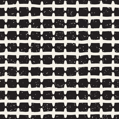 Hand drawn style ethnic seamless pattern. Abstract grungy geometric background in black and white.
